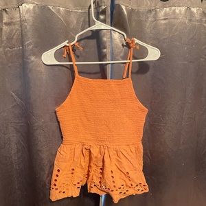 Orange peplum top